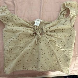 Cute floral tan crop top.